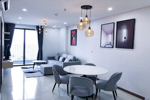 Premier Suite, Multiple Beds, Club Lounge Access, Pool View | Living area | 65-inch Smart TV with cable channels, Netflix, smart speakers - Republic Tan Son Nhat Airport Luxury (Ho Chi Minh City)