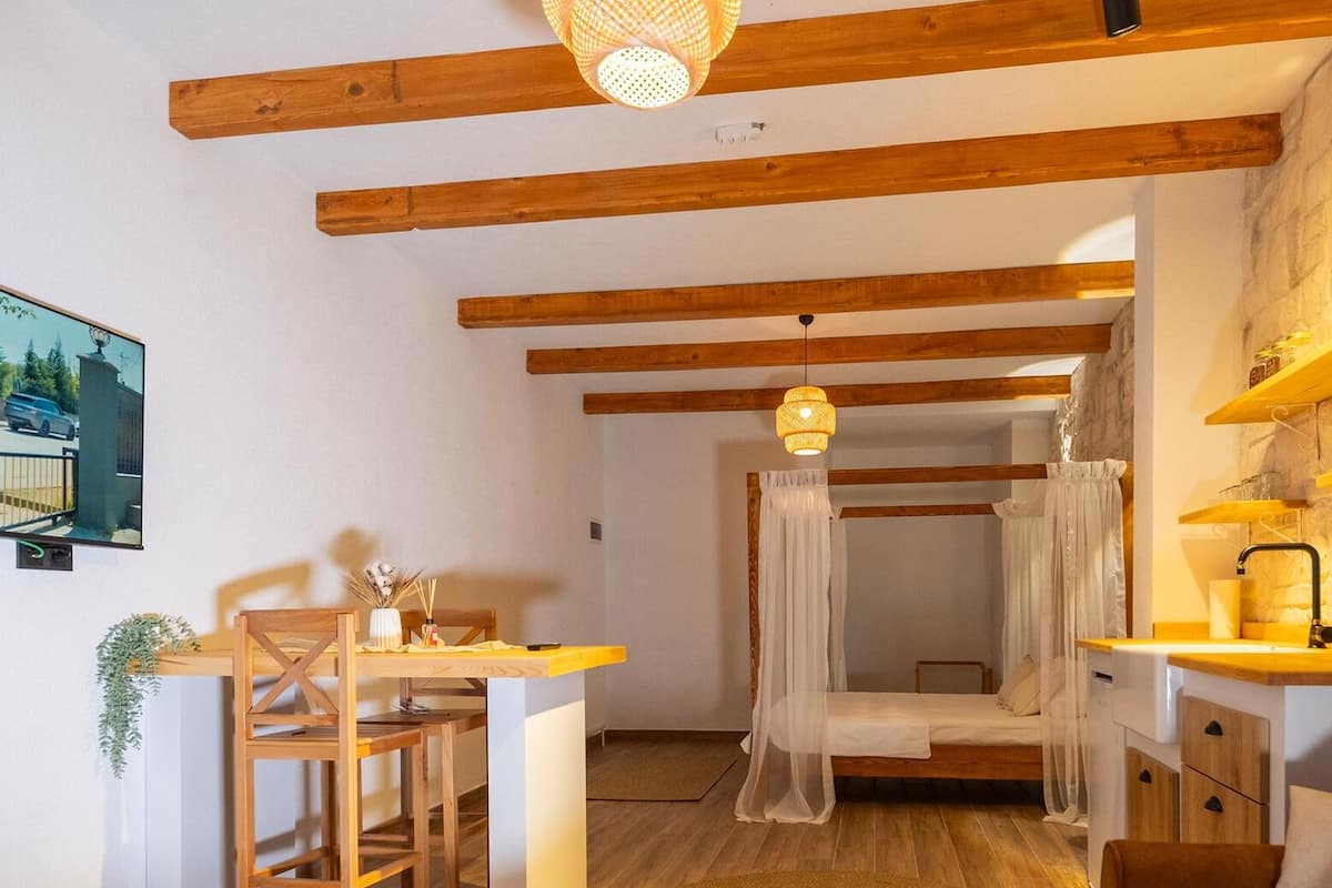 Familien-Vierbettzimmer, Flussblick | Terrasse/Patio