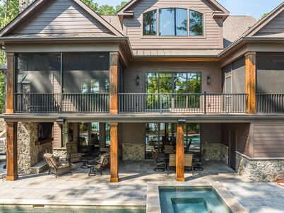 Newly constructed luxury retreat on Lake Thurmond. The sleeping arrangements for this property are 3 queen beds.