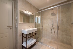 Hair dryer, bidet, towels, soap