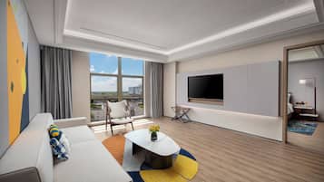 Suite, 1 Bedroom | Premium bedding, down comforters, minibar, desk