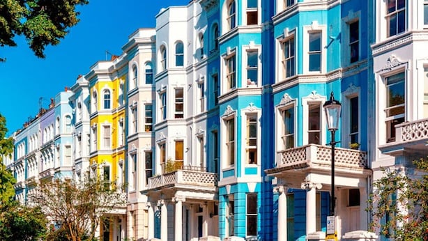 A row of colorful Victorian-style buildings with ornate facades and balconies. - Beautiful Notting Hill Apt (Greater London)