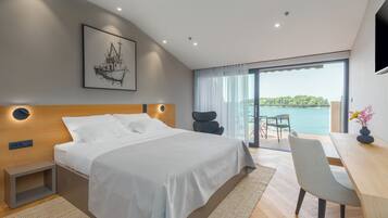 Deluxe Double Room, Balcony, Sea View | Minibar, desk, laptop workspace, soundproofing