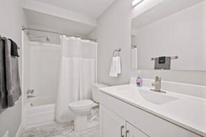 Shower, hair dryer, towels, shampoo - Bright & Airy Urban Unit  Walk to Everything! (Rochester Hills)