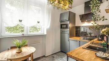 Comfort Apartment, 2 Bedrooms, Balcony | Private kitchen | Fridge, stovetop, electric kettle, cookware/dishes/utensils