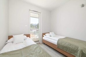 2 dormitorios, tabla de planchar con plancha, wifi y ropa de cama