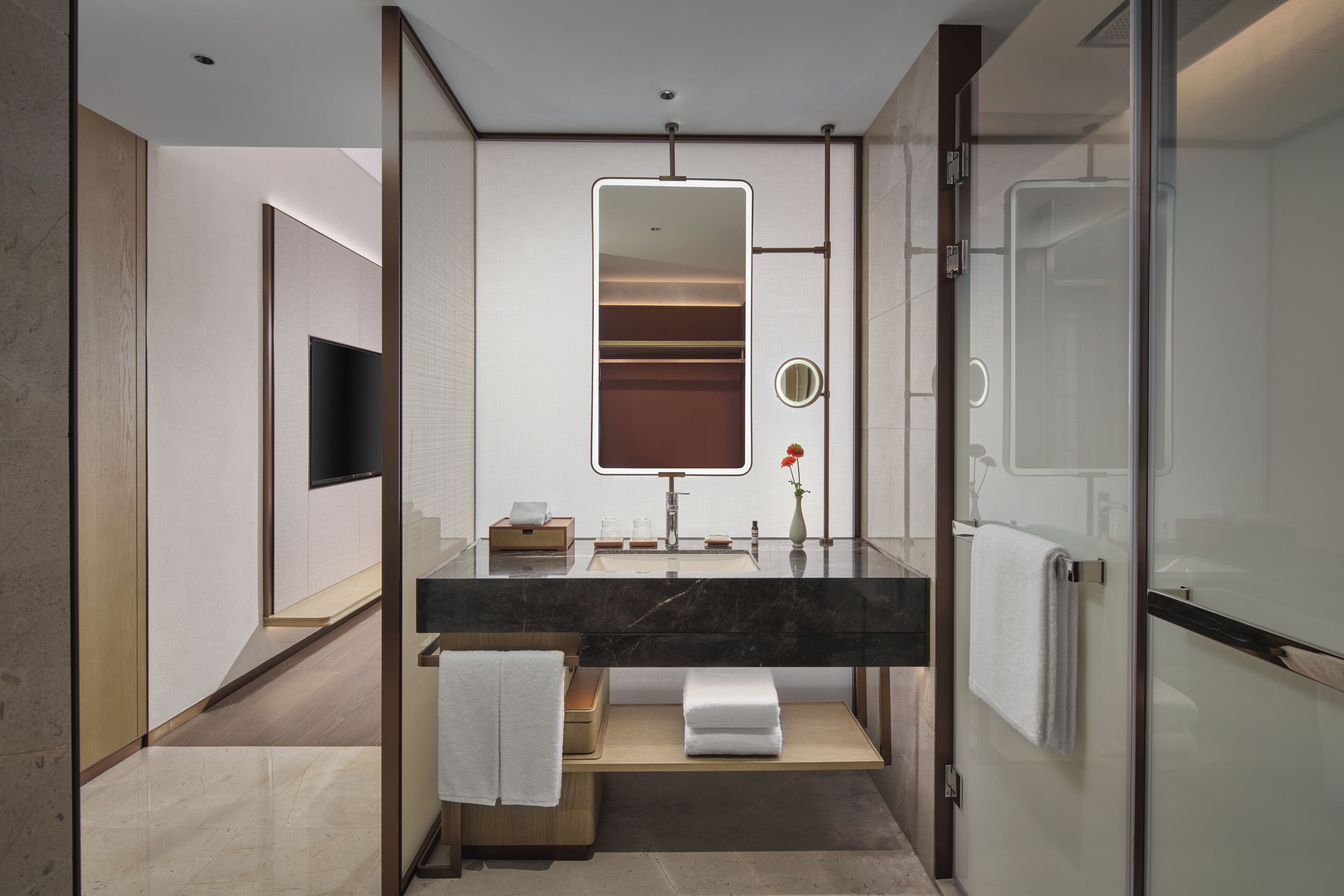 Designer toiletries, hair dryer, bathrobes, slippers