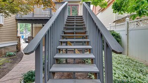 A wooden staircase leading to a house entrance. - Historic Boise Studio w/ Courtyard, Blocks to Dtwn (Boise)