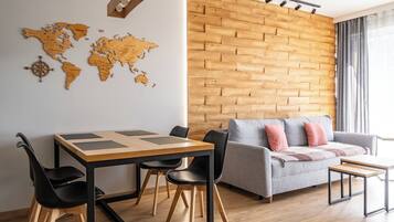 Comfort Apartment | Living room | Flat-screen TV