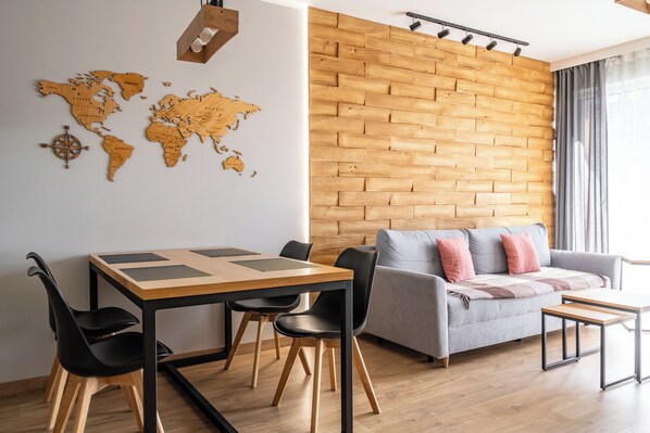 Apartamento conforto | Sala de estar | TV de tela plana