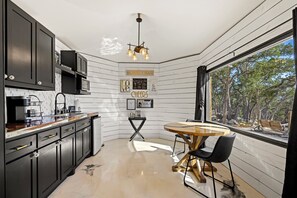 Fridge, microwave, stovetop, coffee/tea maker