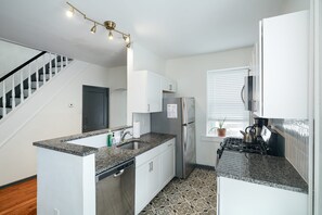 Fridge, microwave, oven, cookware/dishes/utensils