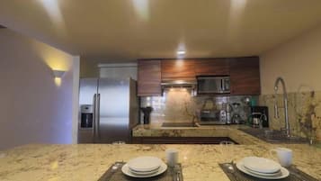 Fridge, microwave, stovetop, coffee/tea maker