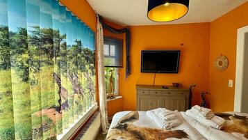 4 bedrooms, in-room safe, iron/ironing board, free WiFi