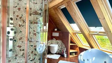 Shower, jetted tub, soap, shampoo