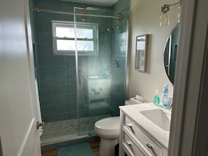 Hair dryer, towels, soap, toilet paper