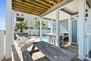 Outdoor dining - Luxury Oceanfront Home: Private Pool, Elevator Access, Game Room & More! (Emerald Isle)