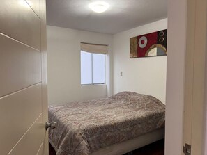 Departamento | 3 habitaciones, tabla de planchar con plancha y wifi gratis 