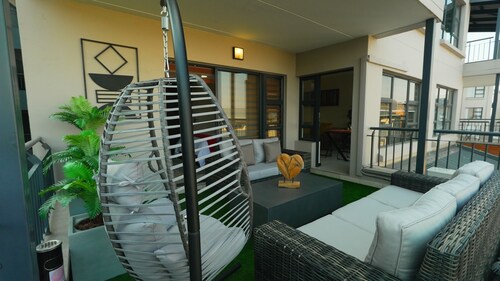 Step into Comfort where contemporary design meets warm hospitality! 