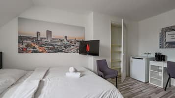 1 slaapkamer, een strijkplank/strijkijzer, wifi, beddengoed