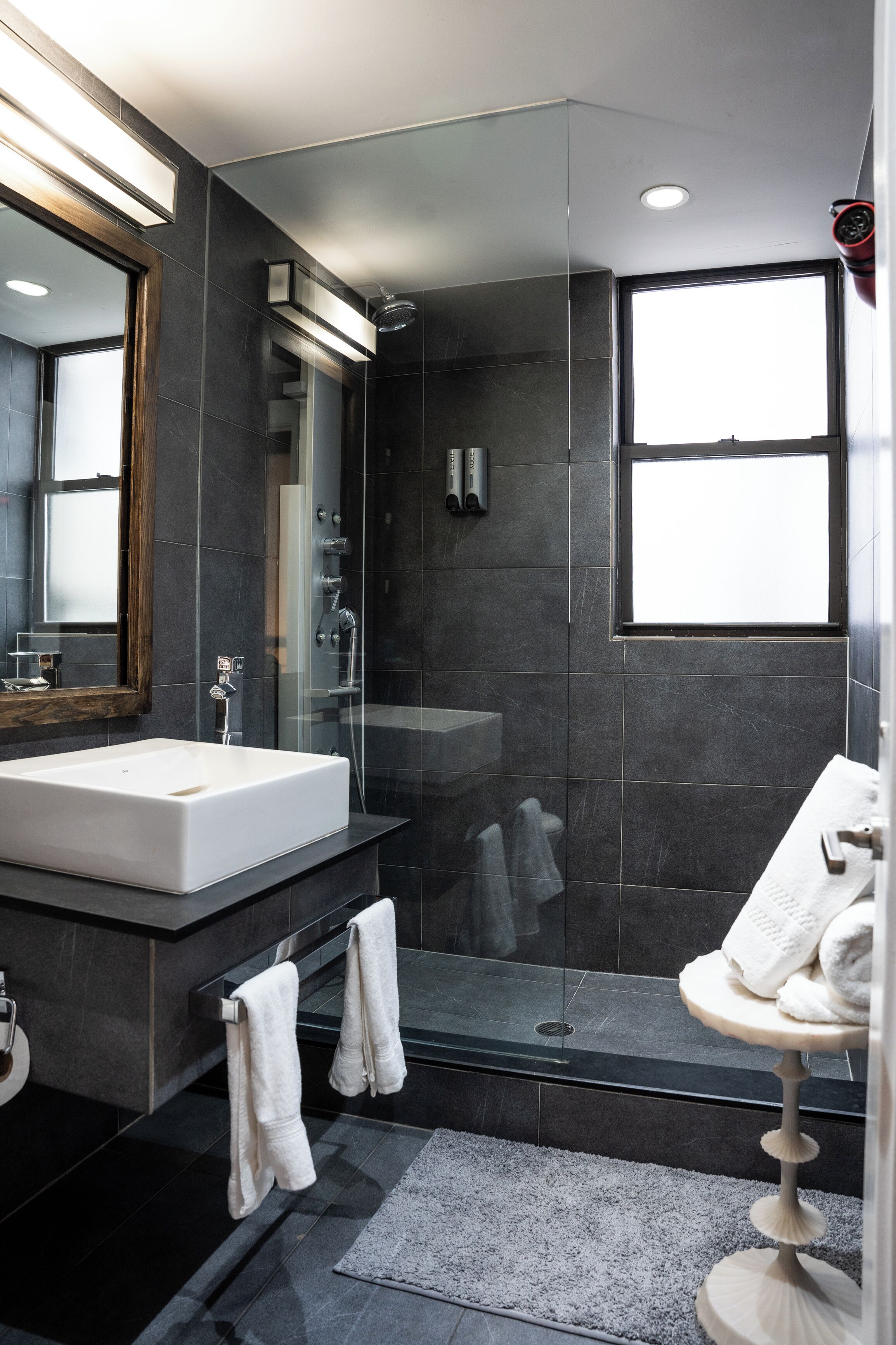 Shower, hair dryer, towels, soap