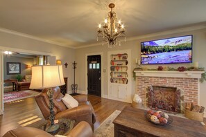 Smart TV, fireplace, books
