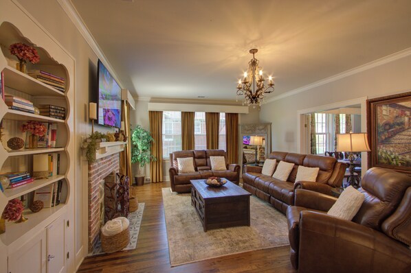 Smart TV, fireplace, books