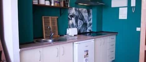 Fridge, microwave, coffee/tea maker, toaster