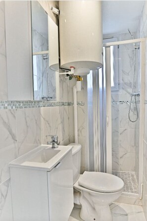 Hair dryer, towels, toilet paper