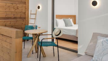 Junior Suite, Pool View | Premium bedding, in-room safe, soundproofing, free WiFi