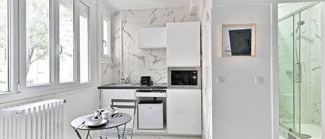 Fridge, microwave, coffee/tea maker, toaster