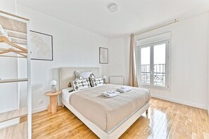 1 bedroom, desk, iron/ironing board, travel crib