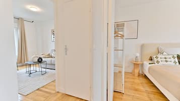 1 bedroom, desk, iron/ironing board, travel crib