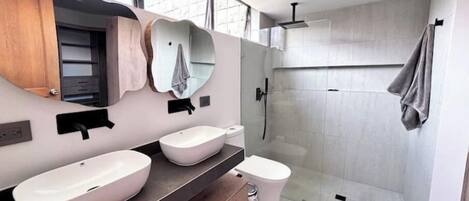 Shower, hair dryer, towels, soap