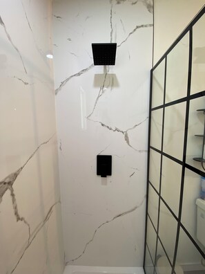 Shower, towels, soap, shampoo