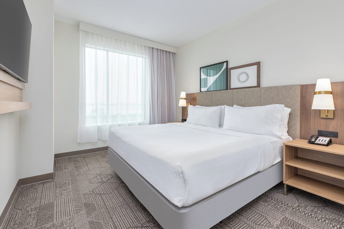 Premium bedding, pillow-top beds, in-room safe, blackout curtains