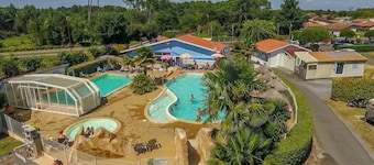 ZEcamping 4 étoiles piscine couverte club enfant locatif TV clim 26m2