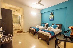 Desk, laptop workspace, bed sheets, wheelchair access - Suraksha Stay Brookfield (Bengaluru)