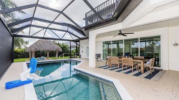 Outdoor pool, a heated pool - Spectacular two story vacation home with 5 bedrooms and 4.5 bathrooms. (Marco island)