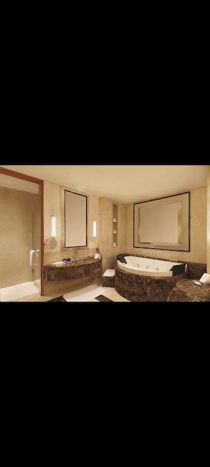Separate tub and shower, hair dryer, towels, soap