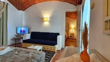 Economy Triple Room, Resort View | In-room safe, desk, laptop workspace, blackout curtains