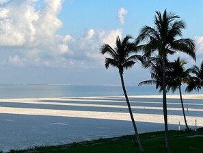 On the beach, sun loungers, beach towels