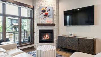 Smart TV, fireplace, books