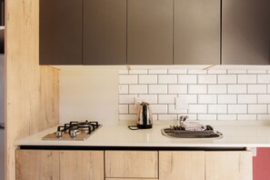 Luxury Studio Suite, 1 Bedroom, Poolside | Private kitchen - Caline VIP Mews (Cape Town)