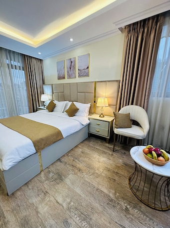Presidential Room, Garden View | Iron/ironing board, free WiFi