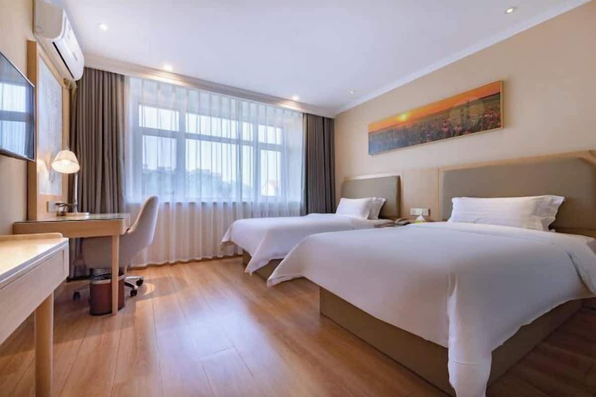 Desk, laptop workspace, blackout drapes, soundproofing