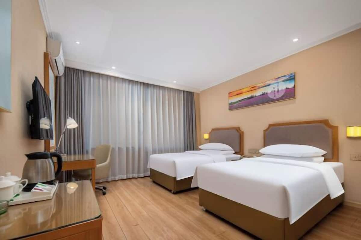 Desk, laptop workspace, blackout drapes, soundproofing