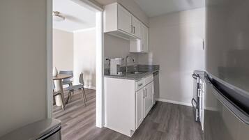 Apartment, 1 Bedroom | Private kitchen | Full-sized fridge, microwave, oven, stovetop