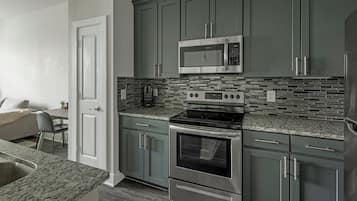 Apartment, 1 Bedroom | Private kitchen | Full-sized fridge, oven, stovetop, dishwasher