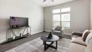 Apartment, 2 Bedrooms | Living area | TV